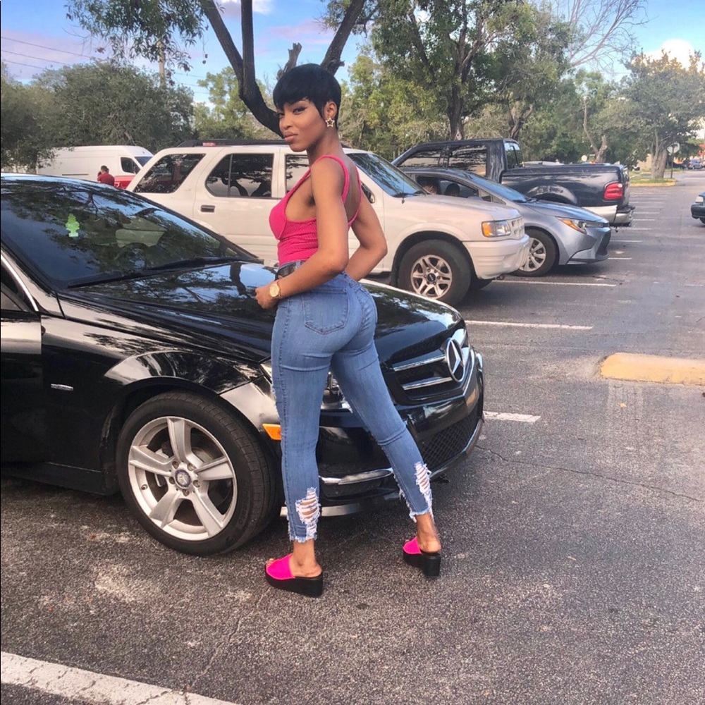 Denim ripped jeans and platform heels
